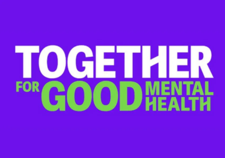 White and green writing on purple background: 'Together for good mental health'