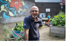 happy man in a garden 