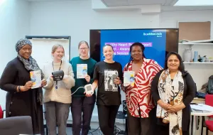 Picture of a group of colleagues at an in person event.