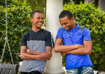 2 boys smiling 