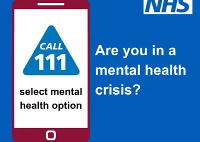 illustration of mobile phone on blue background with NHS logo. Copy reads : are you in a mental health crisis? Call 111, select mental health option.