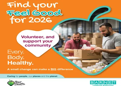 Image shows two men volunteering packing boxes