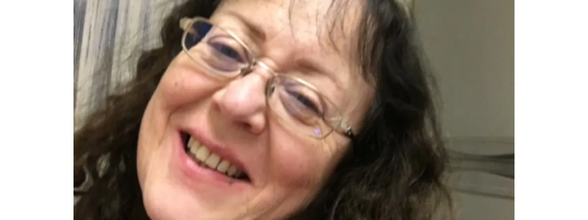 Photo of Adrienne smiling