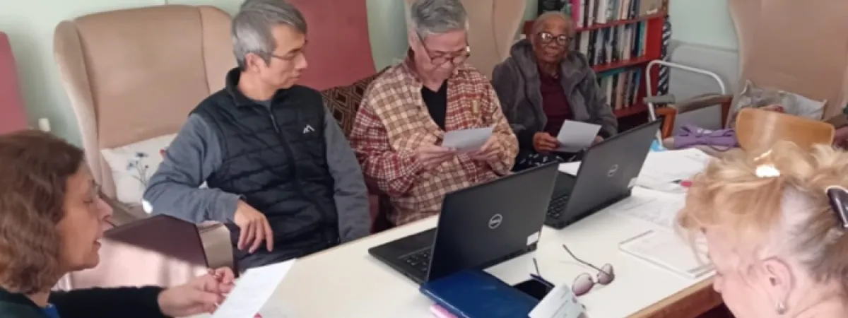 Barnet residents looking at leaflets