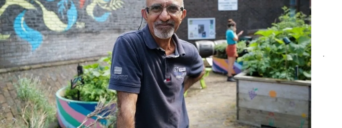 happy man in a garden 