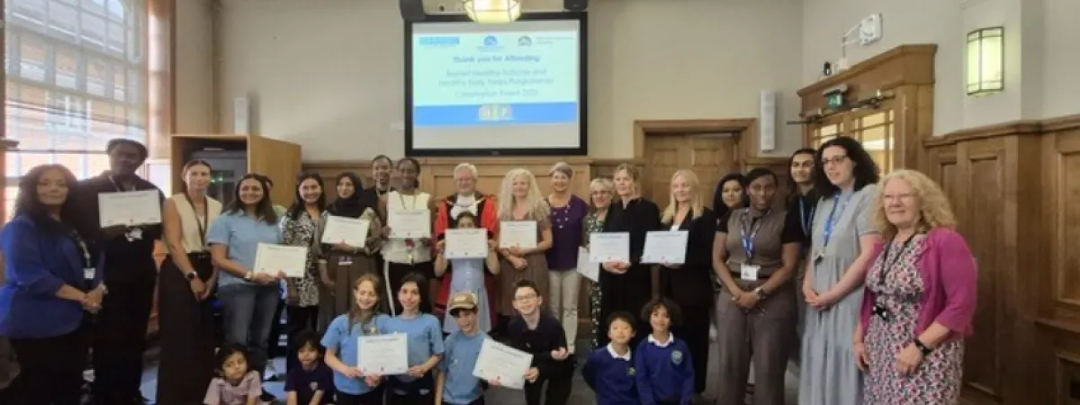 A group photo of all the children, teachers, parents, the mayor and local councillors