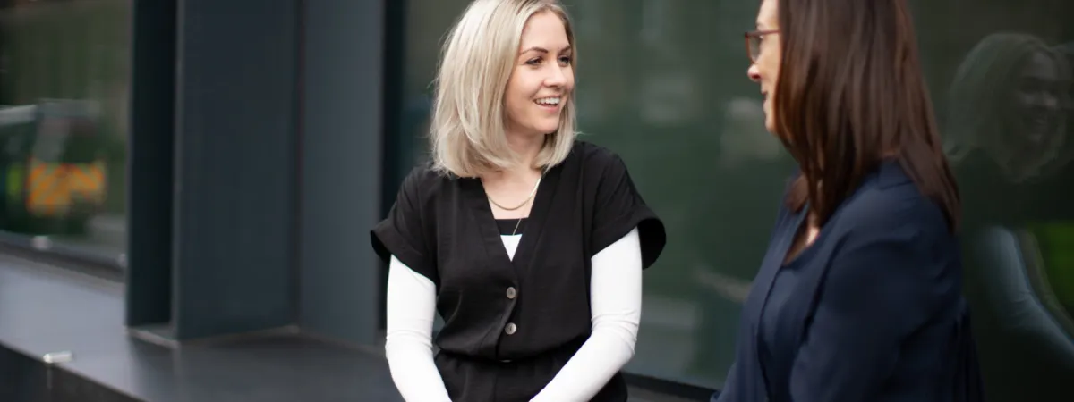 A young woman talking to a Brook Counsellor