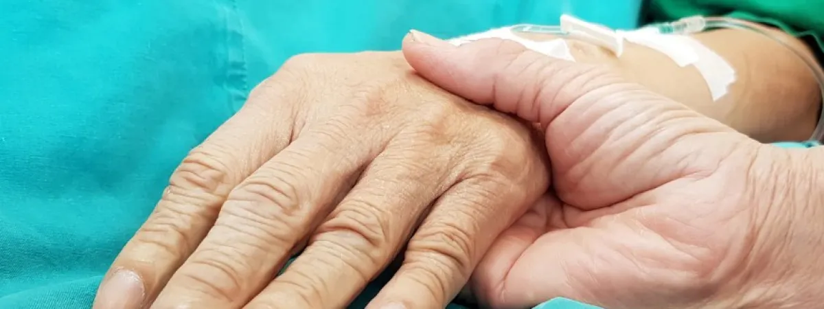 A hand on another hand.